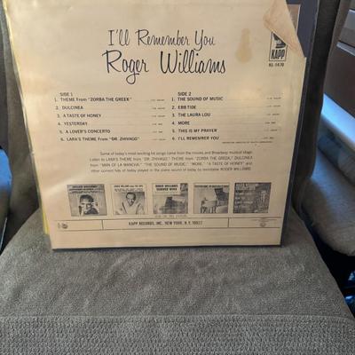 Sale Photo Thumbnail #403: Roger Williams, titled "I'll Remember You". 
Additional details about the album include:
Artist: Roger Williams, a pianist known for his instrumental interpretations.
Album Title: "I'll Remember You".
Record Label: Kapp Records.
Release Year: 1966 or 1967