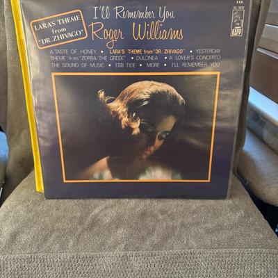 Sale Photo Thumbnail #402: Roger Williams, titled "I'll Remember You". 
Additional details about the album include:
Artist: Roger Williams, a pianist known for his instrumental interpretations.
Album Title: "I'll Remember You".
Record Label: Kapp Records.
Release Year: 1966 or 1967