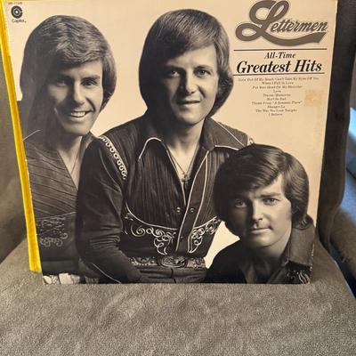 Sale Photo Thumbnail #406: "All-Time Greatest Hits" by The Lettermen. 
Here is information about this album:
Artist: The Lettermen, an American male pop vocal trio known for their close-harmony pop songs.
Album Title: All-Time Greatest Hits.
Label: Capitol Records.
Catalog Number: 