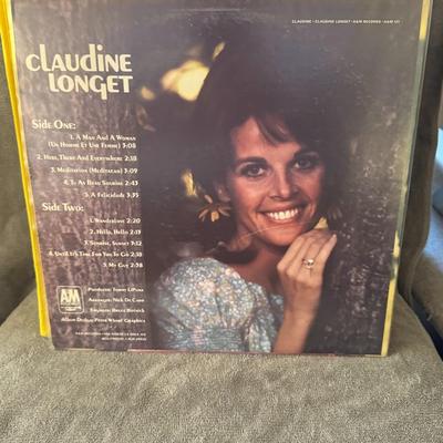 Sale Photo Thumbnail #295: "Claudine" by Claudine Longet, released in 1967 on A&M Records. 
Here's some information about this iconic album:
Artist and Album: The album is the debut LP by French singer and actress Claudine Longet, titled "Claudine".
Release Details: It was released