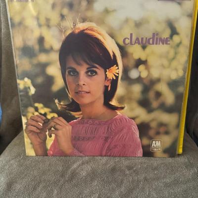 Sale Photo Thumbnail #294: "Claudine" by Claudine Longet, released in 1967 on A&M Records. 
Here's some information about this iconic album:
Artist and Album: The album is the debut LP by French singer and actress Claudine Longet, titled "Claudine".
Release Details: It was released