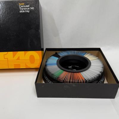 Kodak Carousel stuffed with 35mm slides of unreviewed photos