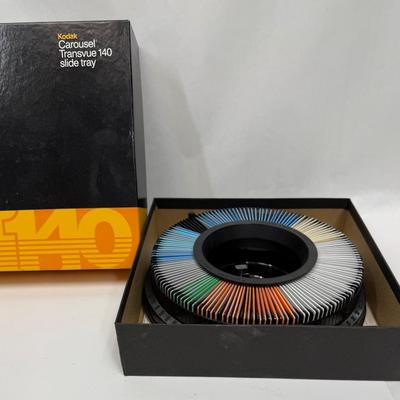 Kodak Carousel stuffed with 35mm slides of unreviewed photos
