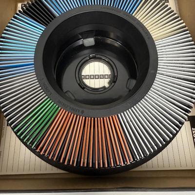 Kodak Carousel stuffed with 35mm slides of unreviewed photos