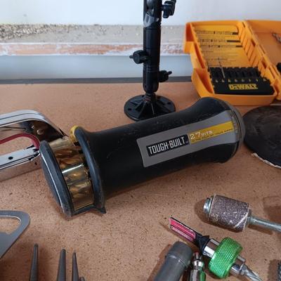A VARIETY OF TOOLS AND ACCESSORIES