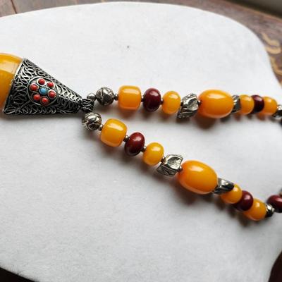 Sale Photo Thumbnail #537: Amber, with Gypsy beading
Collarbone length
