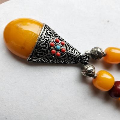 Sale Photo Thumbnail #540: Amber, with Gypsy beading
Collarbone length