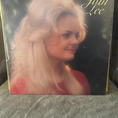 Sale Photo Thumbnail #418: "Joni Lee," a self-titled LP released in 1976 by MCA Records. 
Key facts about Joni Lee:
Joni Lee Ryles (born July 2, 1957, as Joni Lee Jenkins) is an American country music singer.
She is the daughter of Conway Twitty, a Country Music Hall Of Fame induct