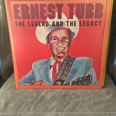 Sale Photo Thumbnail #276: Ernest Tubb: The Legend And The Legacy Volume One, a vinyl LP released in 1979. 
Here's some information about this album:
Artist: Ernest Tubb, a renowned country music artist known as the "Texas Troubadour" and a pioneer of the honky-tonk sound.
Album Ti