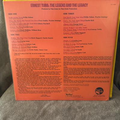 Sale Photo Thumbnail #277: Ernest Tubb: The Legend And The Legacy Volume One, a vinyl LP released in 1979. 
Here's some information about this album:
Artist: Ernest Tubb, a renowned country music artist known as the "Texas Troubadour" and a pioneer of the honky-tonk sound.
Album Ti