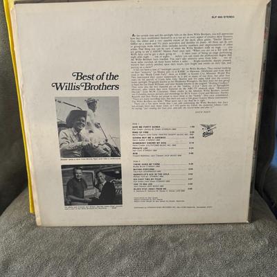 Sale Photo Thumbnail #443: "The Best of The Willis Brothers". This is a compilation album of country music by the American group The Willis Brothers. 
Key details about this album include:
Artist: The Willis Brothers, known for their country and truck-driving music.
Album Title: Th