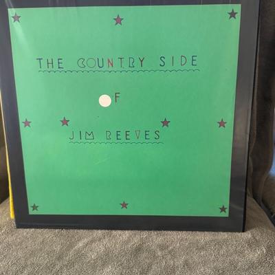 Sale Photo Thumbnail #454: "The Country Side of Jim Reeves."
Here is information about the album:
Artist: Jim Reeves.
Release Year & Label: The album was released in 1962 on RCA Camden.
Genre: The album is country music.
Format: It is a 12-inch LP vinyl record, typically playing at