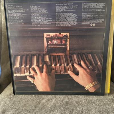 Sale Photo Thumbnail #257: Jerry Lee Lewis, the legendary American singer, songwriter, and pianist, often referred to as "The Killer".
Album Title: Country Memories.
Release Information: It is a studio album released in 1977 on Mercury Records.
Genre: Primarily country, reflecting 