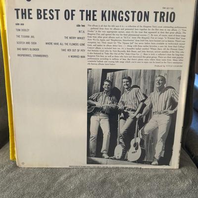 Sale Photo Thumbnail #293: "The Best Of The Kingston Trio", a compilation album by the iconic folk music group, The Kingston Trio. 
Key details about the album:
Artist: The Kingston Trio.
Title: The Best Of The Kingston Trio.
Label: Capitol Records, under "The Star Line" imprint.
F