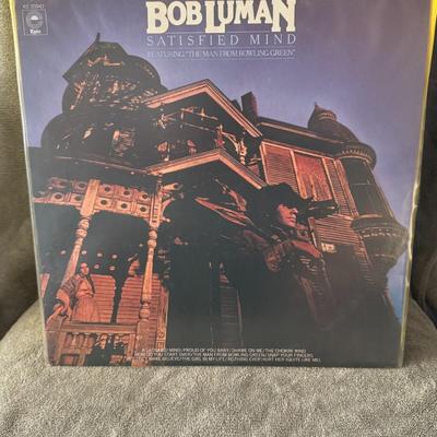 Sale Photo Thumbnail #464: "Satisfied Mind" by Bob Luman, released on Epic Records in 1976. The album's catalog number is KE 33942. 
Key details about the album:
Artist: Bob Luman
Album Title: Satisfied Mind
Record Label: Epic
Release Year: 1976
Catalog Number: KE 33942
Notable Tra