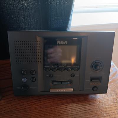 ATOMIC CLOCK AND A RCA ALARM CLOCK RADIO