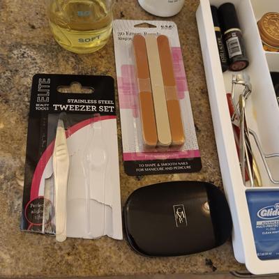 AN ASSORTMENT OF MAKEUP AND NAIL CARE