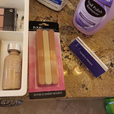 AN ASSORTMENT OF MAKEUP AND NAIL CARE