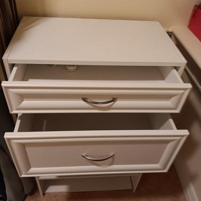 A CLOSET CHEST WITH PULL OUT BASKET