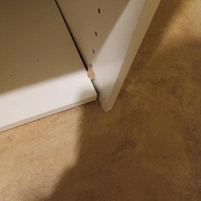 A CLOSET CHEST WITH PULL OUT BASKET