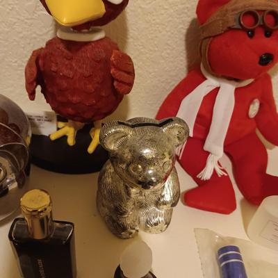 PIGGY BANKS, BOBBLE HEADS, PERFUME AND MORE