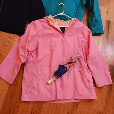 2 LADIES RAIN COATS (XL) AND A LIGHT JACKET (XL) PLUS AN UMBRELLA