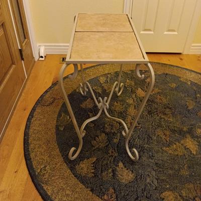 ROUND AREA RUG, IRON SIDE TABLE WITH TILE TOP AND 2 DOOR MATS