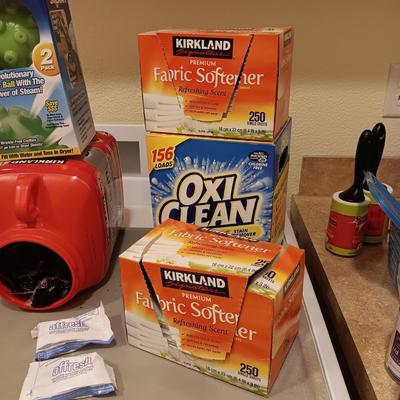LAUNDRY DETERGENTS AND 2 LAUNDRY BASKETS