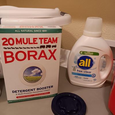LAUNDRY DETERGENTS AND 2 LAUNDRY BASKETS