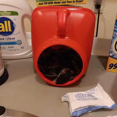 LAUNDRY DETERGENTS AND 2 LAUNDRY BASKETS