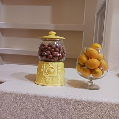 AN UNIQUE COOKIE JAR AND A GLASS BOWL OF FAUX LEMONS