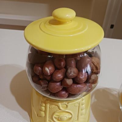 AN UNIQUE COOKIE JAR AND A GLASS BOWL OF FAUX LEMONS