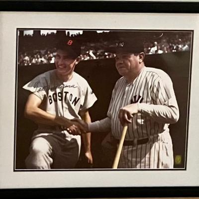Sale Photo Thumbnail #23: Ted Williams photograph with baseball legend Babe Ruth. Signed by Ted Williams.
Measures 16 inches high and 20 inches wide. Matting inside frame needs to be replaced.