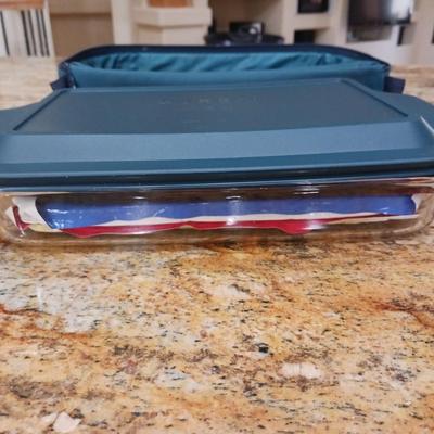 CASSEROLE DISH WITH INSULATED CARRIER AND A STEAMER