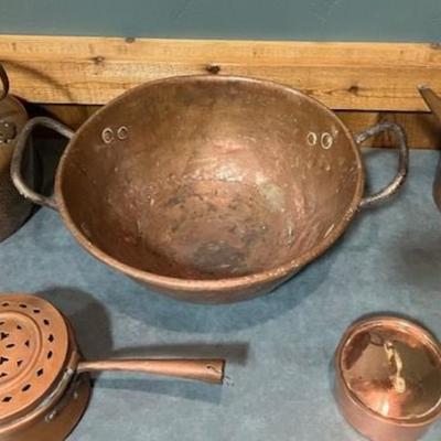 Sale Photo Thumbnail #97: Vintage hammered copper coffee pot, large tea pot, large bowl, two pots.
Minor to moderate wear.