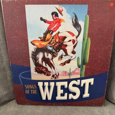Sale Photo Thumbnail #322: Songs of the West Collector's  compilation of classic Western and cowboy-themed music. 
Here's more information about this product:
Content: This box set features a wide range of songs, including traditional cowboy classics, tunes from Hollywood Western f