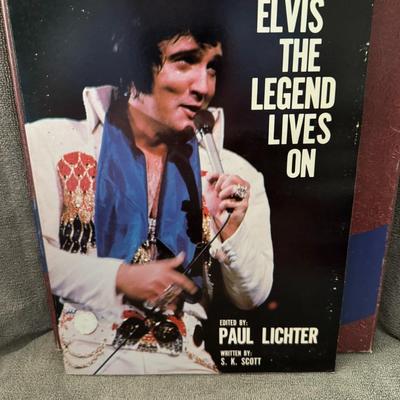 Sale Photo Thumbnail #64: Elvis: The Legend Lives On".
Here are some details about this book:
Subject: This book celebrates the life and enduring legacy of Elvis Presley, often referred to as "The King of Rock & Roll".
Authorship: It was edited by Paul Lichter and written by S. K.