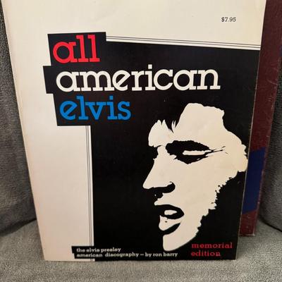 Sale Photo Thumbnail #498: "All American Elvis: The Elvis Presley American Discography" by Ron Barry, identified as a Memorial Edition. 
Here's what you should know about it:
Content: This book provides a comprehensive discography of Elvis Presley's American record releases, detail
