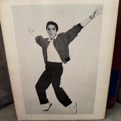 Sale Photo Thumbnail #499: "All American Elvis: The Elvis Presley American Discography" by Ron Barry, identified as a Memorial Edition. 
Here's what you should know about it:
Content: This book provides a comprehensive discography of Elvis Presley's American record releases, detail