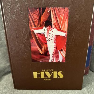 Sale Photo Thumbnail #527: "The Life of Elvis Presley" by Sean Shaver, a notable photographer known for his extensive work capturing images of Elvis Presley. 
Here's more information about this book:
Author & Content: The photographs in the book were primarily taken by Sean Shaver,