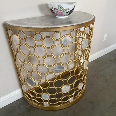 Gold side table with marble top and accents