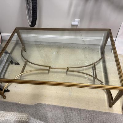 Gold coffee table with glass top