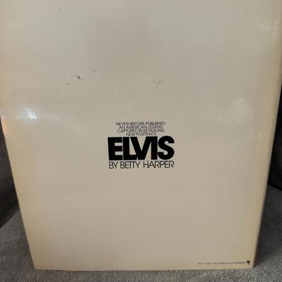 Sale Photo Thumbnail #488: "Newly Discovered Drawings of Elvis Presley by Betty Harper". 
Here's some information about the book:
Author: Betty Harper.
Subject: It features a collection of drawings of Elvis Presley created by artist Betty Harper.
Publication: The book was published