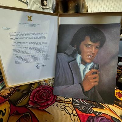 Sale Photo Thumbnail #495: Official Elvis Presley Collection Concert Photo Album from 1977, created by Boxcar Enterprises. 
Here's more information about this item:
Content: This photo album features full-page color photographs of Elvis Presley in concert, along with Elvis/RCA adve
