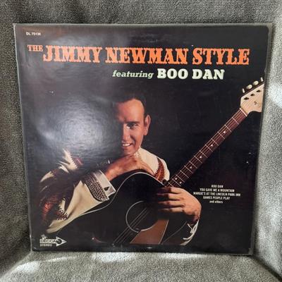 Sale Photo Thumbnail #474: "The Jimmy Newman Style featuring Boo Dan" by American country music artist Jimmy C. Newman. 
Details about the album:
Artist: Jimmy C. Newman.
Title: The Jimmy Newman Style featuring Boo Dan.
Release Year: 1969.
Record Label: Decca Records, catalog numbe