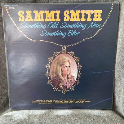 Sale Photo Thumbnail #324: "Something Old, Something New, Something Blue" by Sammi Smith. 
This vinyl LP album was released by Mega Records in 1972. Sammi Smith, a country music artist, recorded an album with country, contemporary country, and bluegrass elements. The album includes