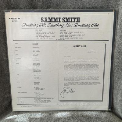 Sale Photo Thumbnail #325: "Something Old, Something New, Something Blue" by Sammi Smith. 
This vinyl LP album was released by Mega Records in 1972. Sammi Smith, a country music artist, recorded an album with country, contemporary country, and bluegrass elements. The album includes