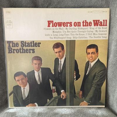 Sale Photo Thumbnail #336: "Flowers on the Wall" by The Statler Brothers. 
Here's some information about this iconic album:
Artist: The Statler Brothers.
Album Title: Flowers on the Wall.
Release Year: Originally released in 1966.
Genre: Primarily Country and Folk.
Key Information: