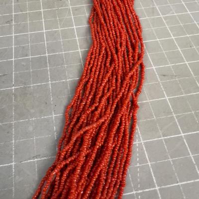 Sale Photo Thumbnail #162: 32" Long. With Silver Clasp. Has about 28 strands on it. THIS IS A NICE WEARABLE PIECE!!!!! 