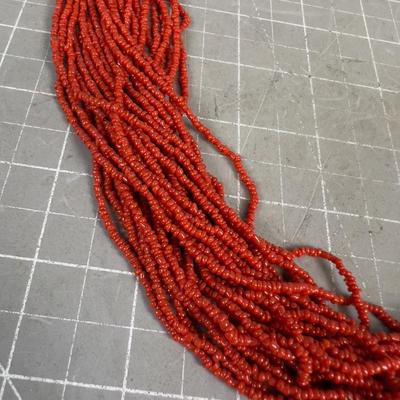 Sale Photo Thumbnail #161: 32" Long. With Silver Clasp. Has about 28 strands on it. THIS IS A NICE WEARABLE PIECE!!!!! 